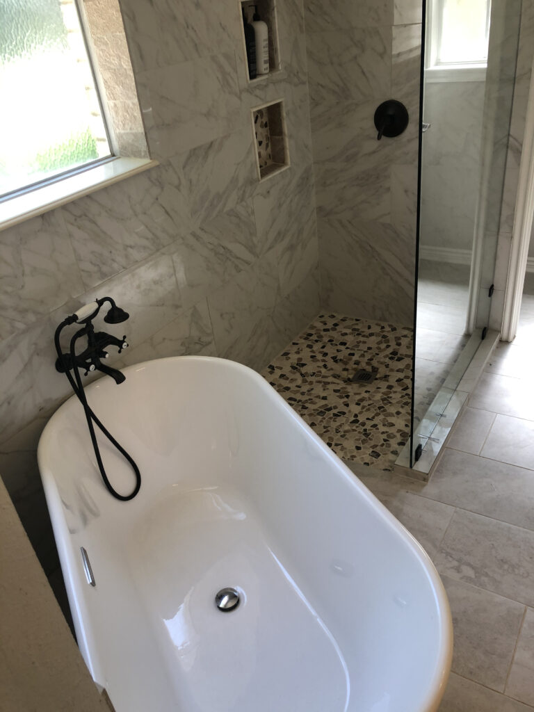walking shower with freestanding tub at a bathroom renovation